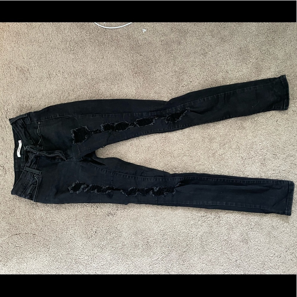 Black 711 Ripped Levi skinny jeans